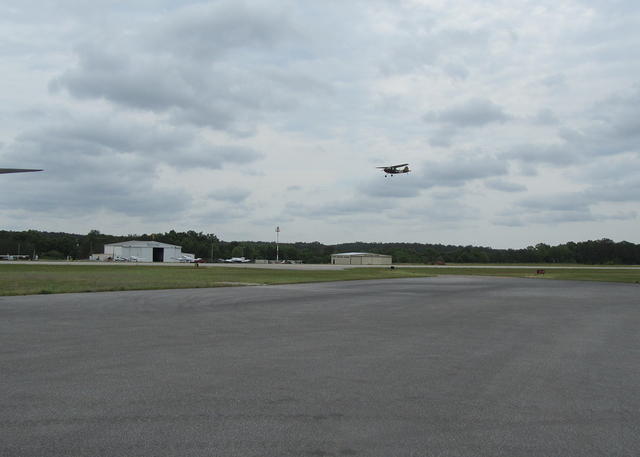 The AAHF Bird Dog performs a flyby to honor our fallen