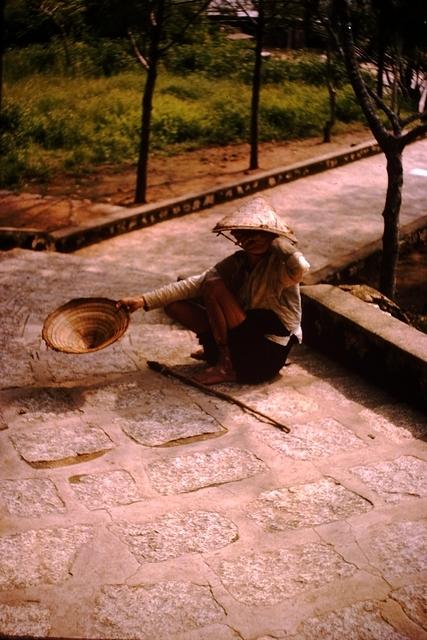 A beggar at Buddhist Temple Phan Rang