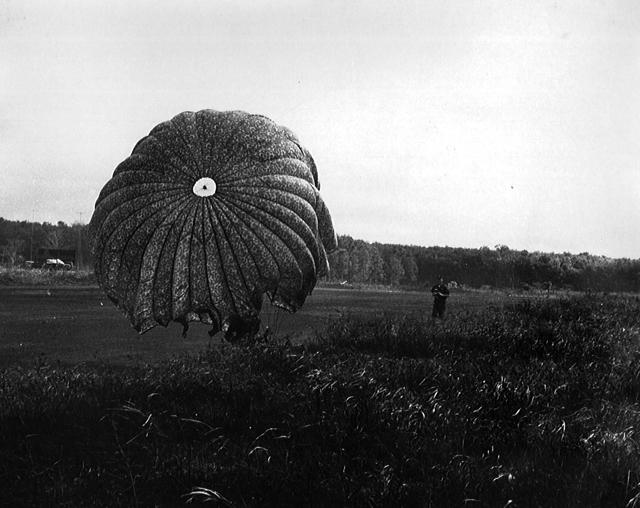 parachutes deployed from ammunition box following practice drop at Ban Me Thout