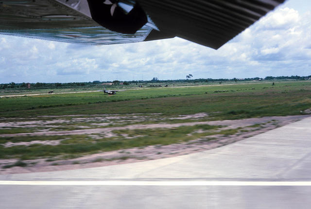 Landing at Saigon Wrecked Otter in the Grass