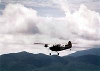57-2901 flies out over the mountains on a photo-recon mission